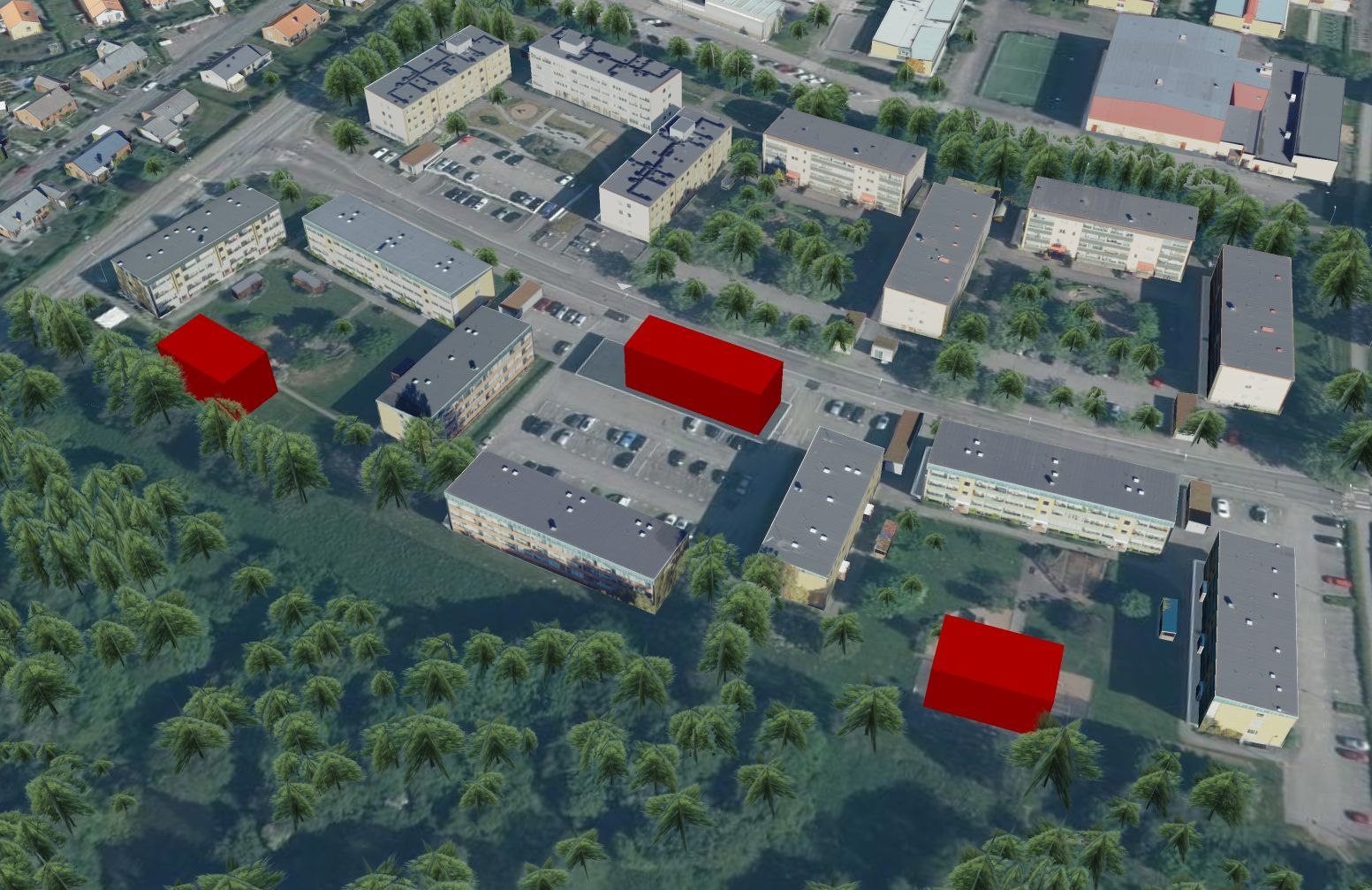 Volymmodell över hur planområdet skulle kunna bebyggas enligt det aktuella planförslaget. Nya byggnader i rött.